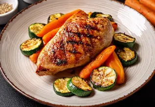 Poulet grillé aux épices et légumes rôtis